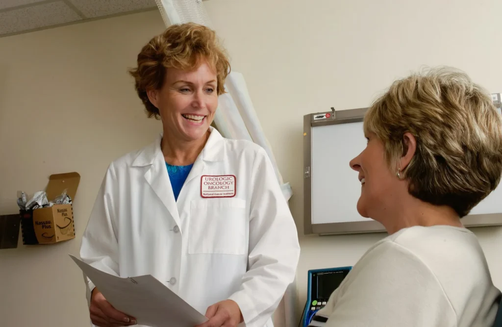 A clinician talking with a patient